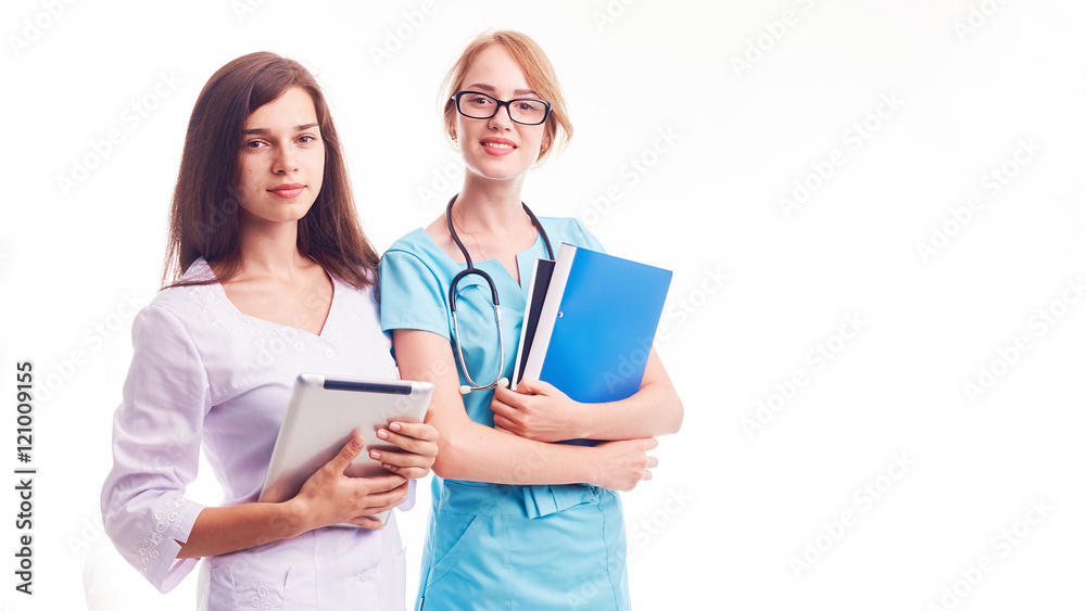 Two Businesswomen Having Discussion In Office Two Businesswomen Having Discussion In Office