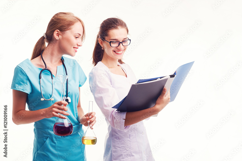Smiling female doctor with a folder in uniform standing Smiling female doctor with a folder in uniform standing