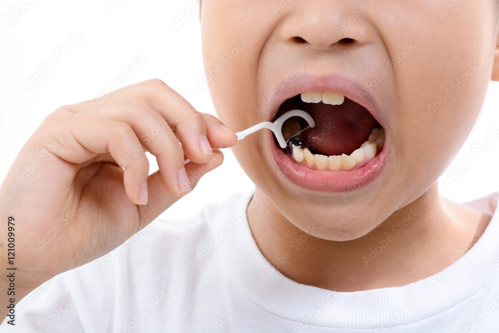 Fototapeta premium Boy use toothpick