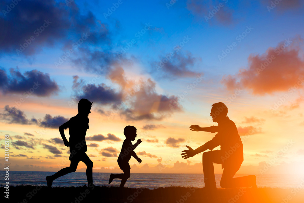 Fototapeta premium Silhouette children as well as running, cycling friends playfull