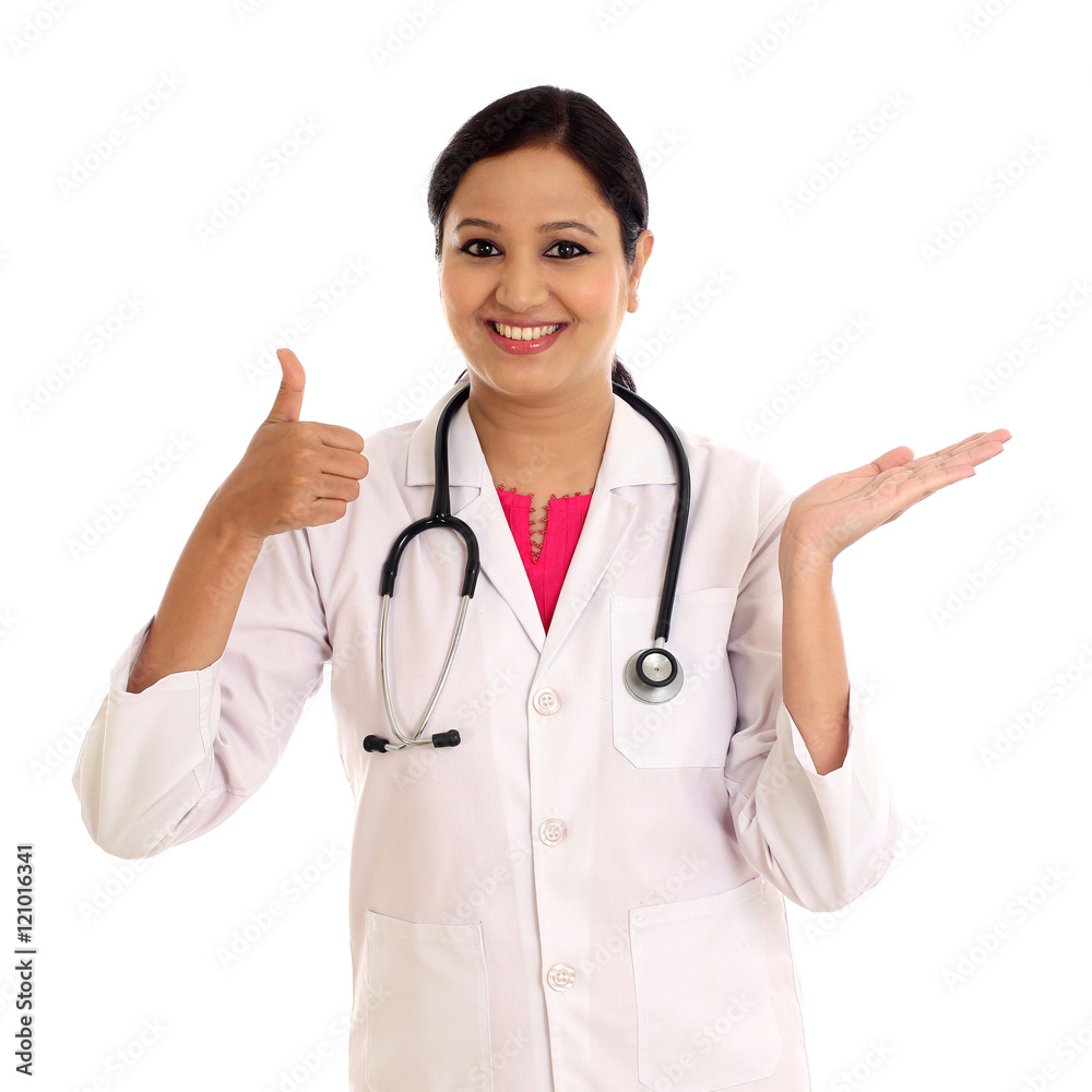 Young doctor woman presenting and showing copy space Young doctor woman presenting and showing copy space