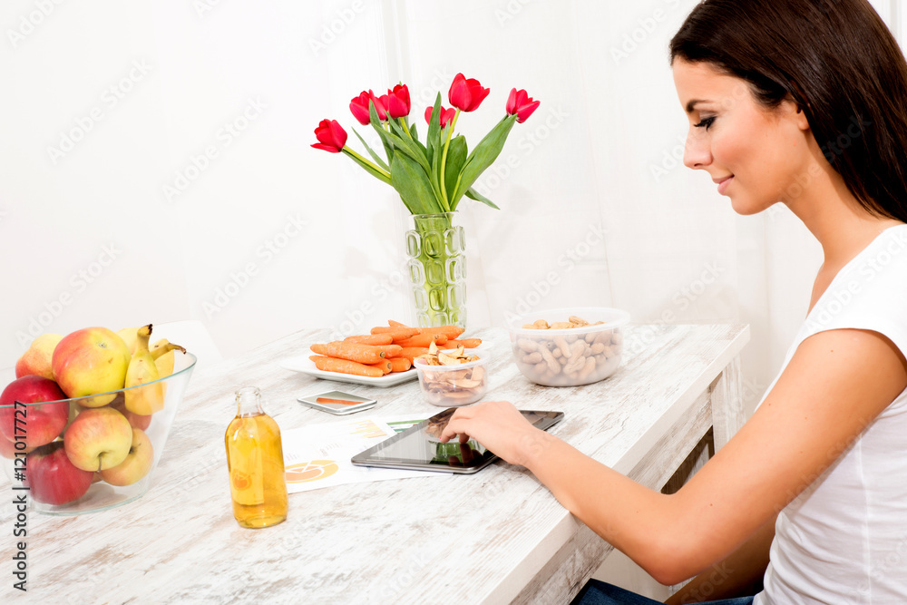 Young beautiful woman with a Tablet PC at home Young beautiful woman with a Tablet PC at home