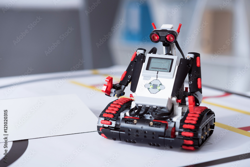 Small hunan-like robot sited on the table