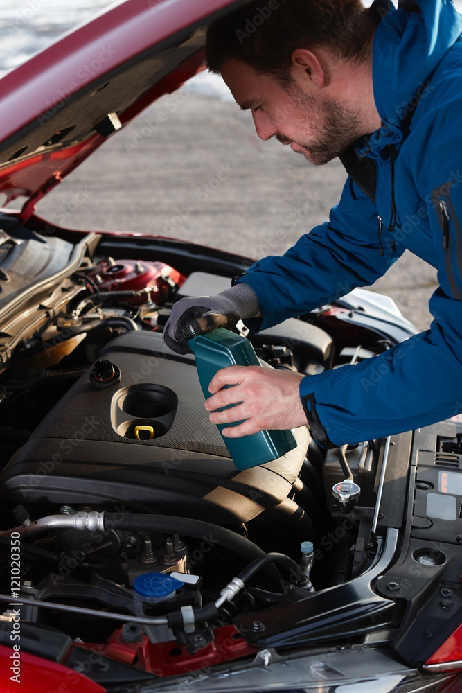 Checking the oil level in a modern car Checking the oil level in a modern car