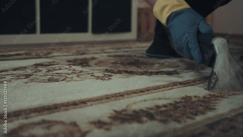 Dry cleaning carpet with hand tools Dry cleaning carpet with hand tools