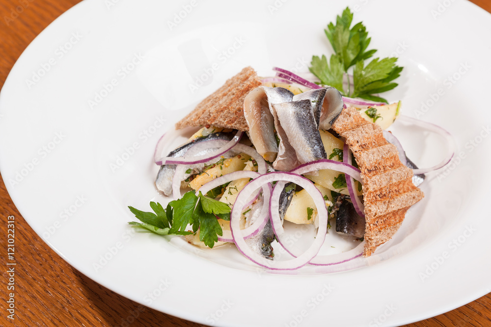 Salad with potatoes sprat and onions Salad with potatoes sprat and onions