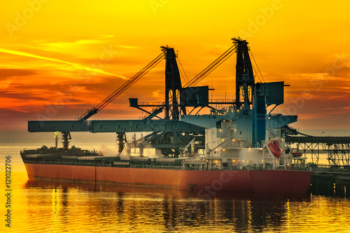 Big ship under loading coal in Port of Gdansk, Poland. photo