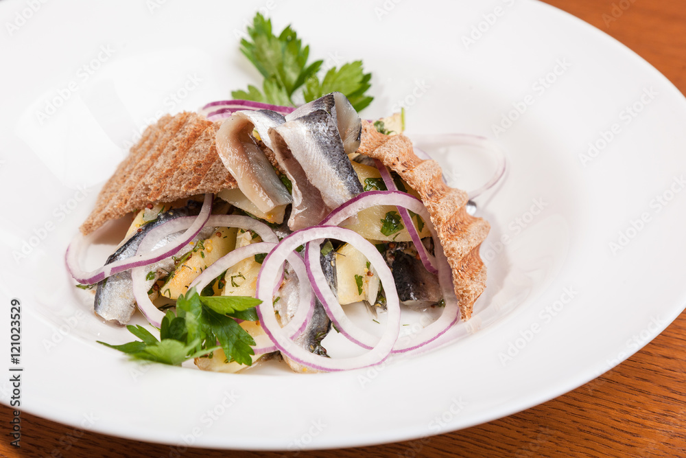 Salad with potatoes sprat and onions Salad with potatoes sprat and onions