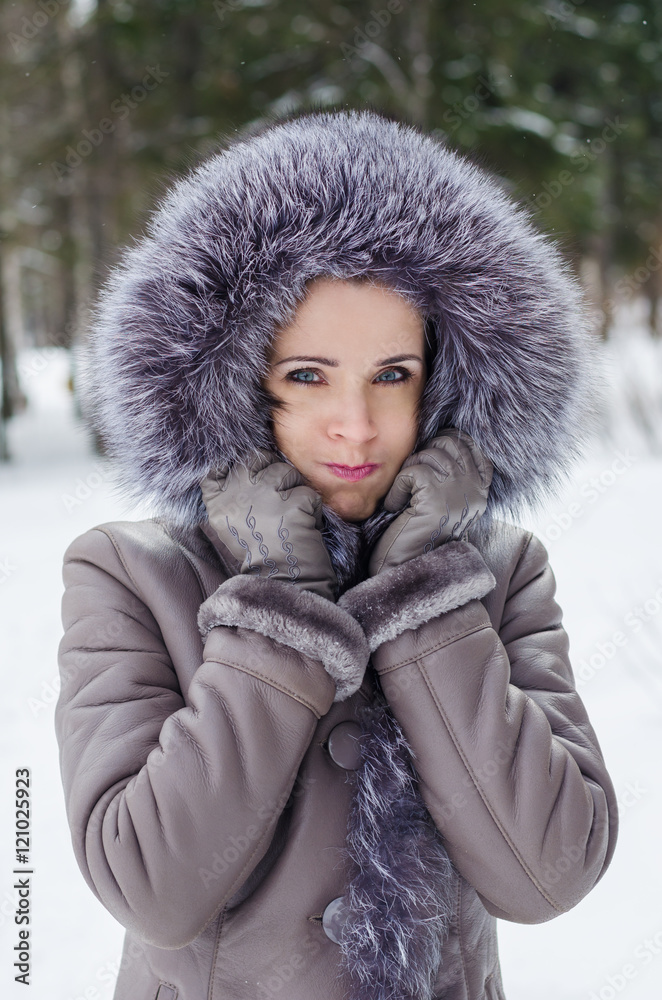 funny portrait of beautiful woman on winter walk funny portrait of beautiful woman on winter walk
