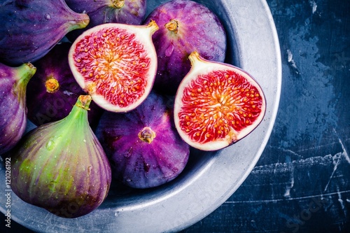 Fresh ripe figs in a bowl closeup photo