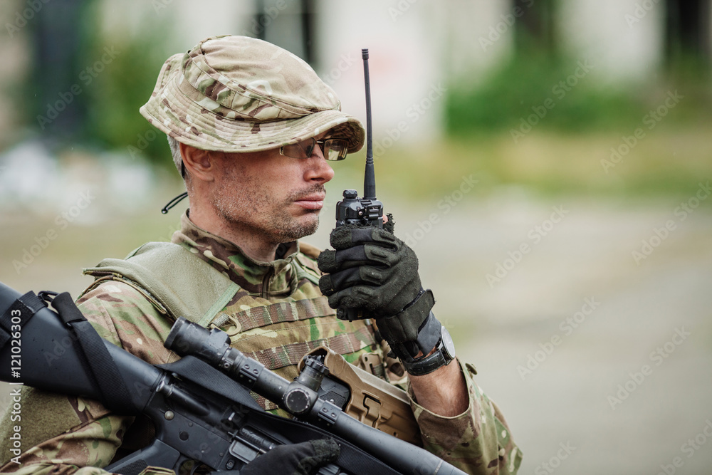 soldier holds a radio station, and give orders subdivision.. soldier holds a radio station, and give orders subdivision..