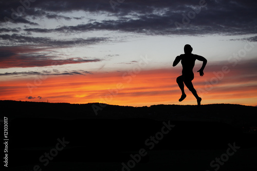 Silhouette of runner during outdoor cross-country running