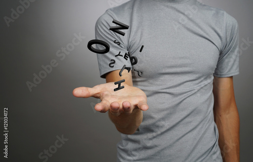 Foto Man working with a set of letters, writing concept.
