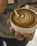 Barista making a cup of coffee