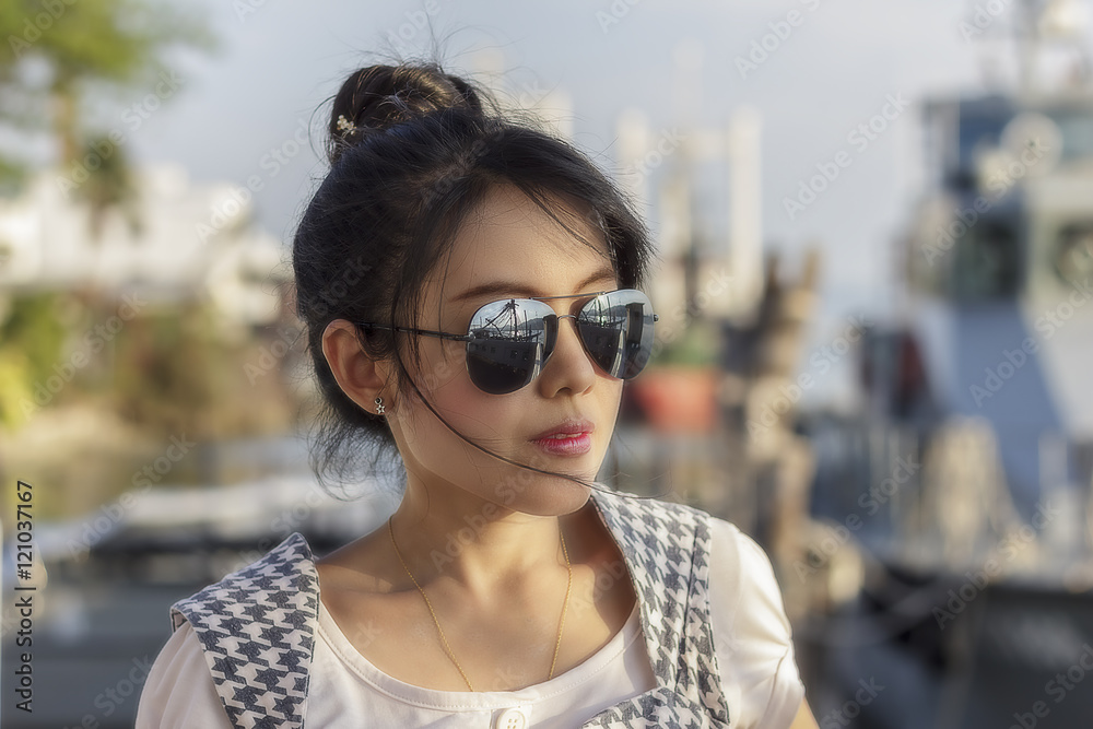 woman wearing sunglasses woman wearing sunglasses