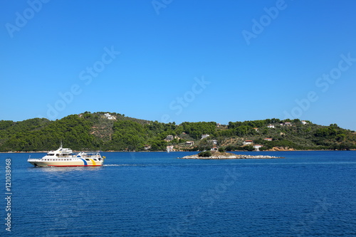 Pessenger ship in the Aegean Sea near the island of Skiathos,Greece photo