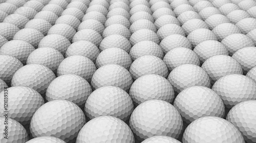 An ordered array of golf balls under neat studio lighting.