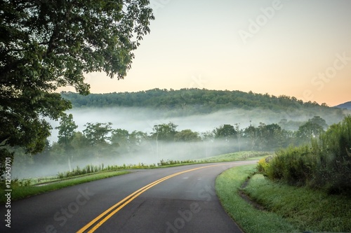 fog rolling through blue ridge parkway farm lands