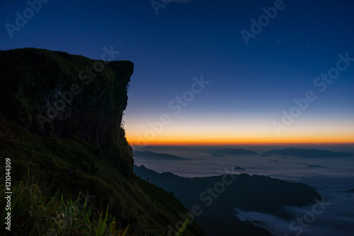 Beautiful Sunrise over a Silhouetted Horizon on phu chi fa , ch