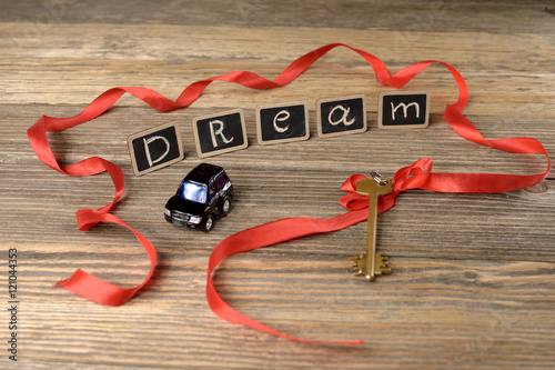 The word dream on a wooden background, concept