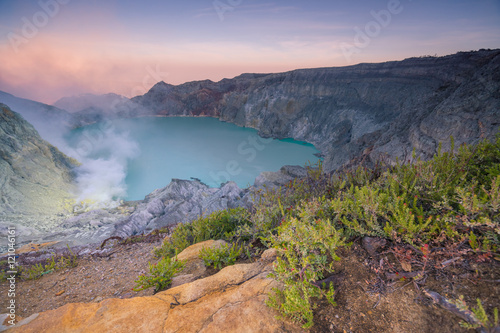 Sulfur fumes from the crater and Sunrise at Kawah Ijen Volcano