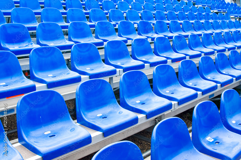 Empty blue stadium seats
Empty blue stadium seats