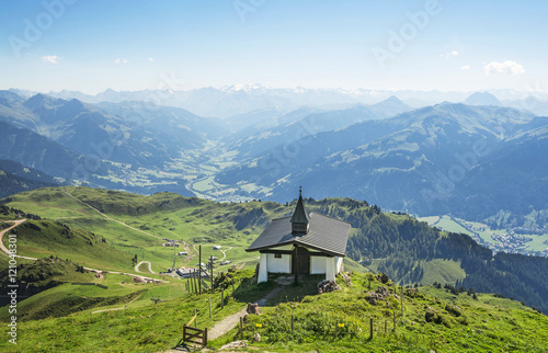 Little church on Kitzbuhel peak, Alps mountains, Austria photo