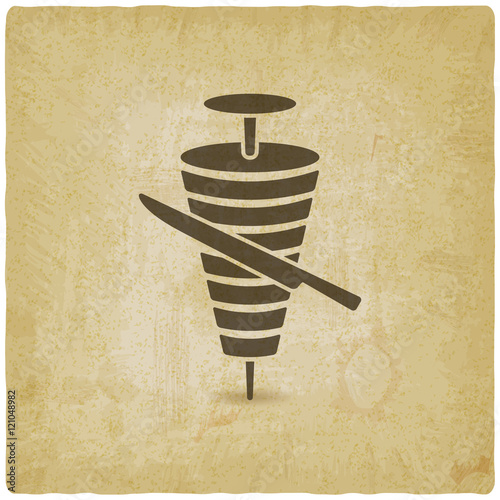 doner kebab with knife old background