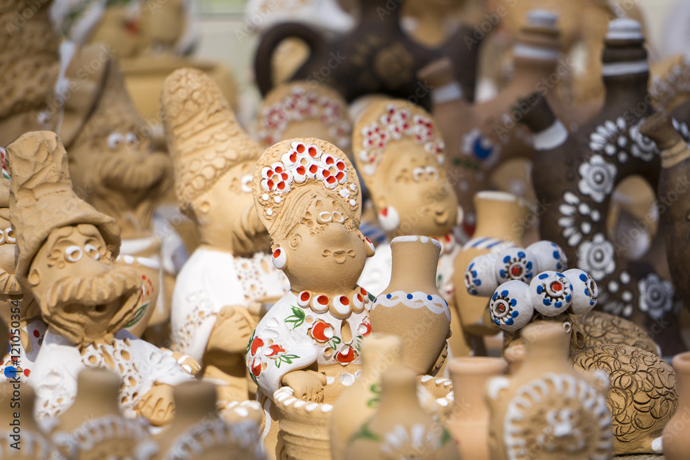 Ukrainian clay souvenir figurines during Petrykivsky Divotsvet in Petrykivka, Ukraine