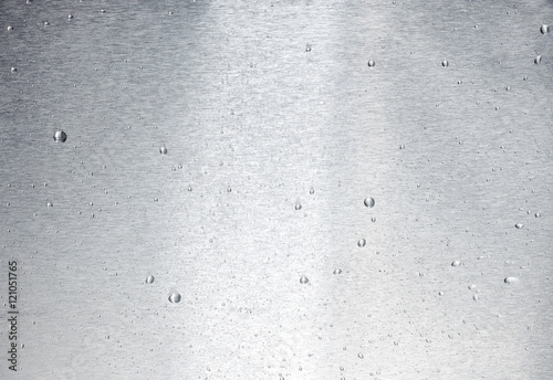 aluminum surface with drops of water
