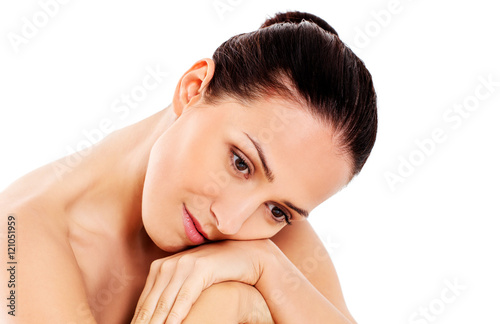 Young spa woman sitting on the floor