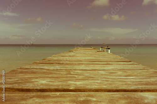 Принти на полотні retro style photography: Wooden gangplank with caribbean sea view