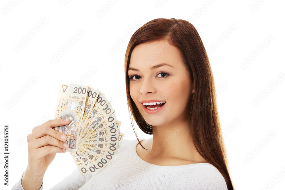 Happy young lady holding cash-polish zloty Happy young lady holding cash-polish zloty
