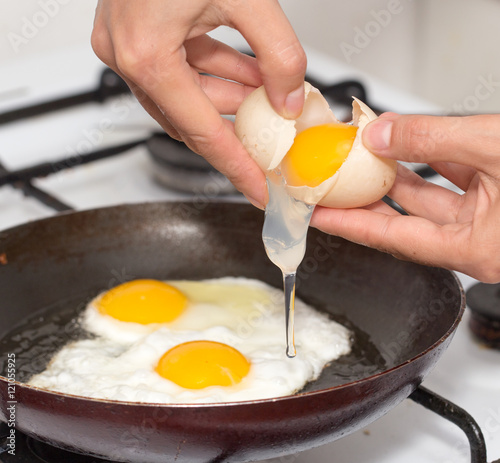 Vászonkép Fried egg in a frying pan