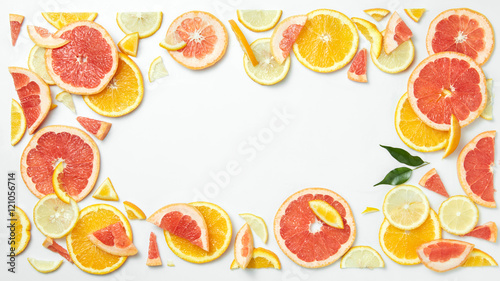 citrus fruit frame of slices isolated on white background