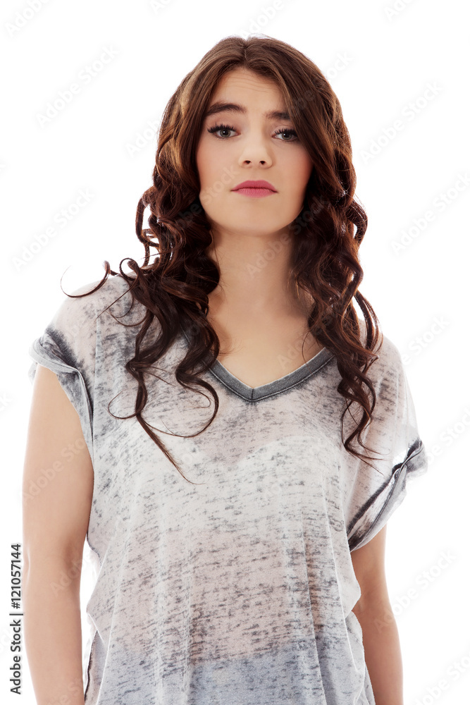 Young unhappy woman with long dark hair. Young unhappy woman with long dark hair.