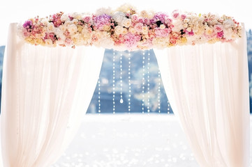 wedding arch decorated with flowers