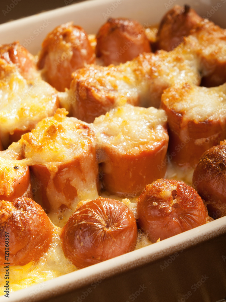 Casserole with sausage and mozzarella in a baking dish. Vertical Casserole with sausage and mozzarella in a baking dish. Vertical