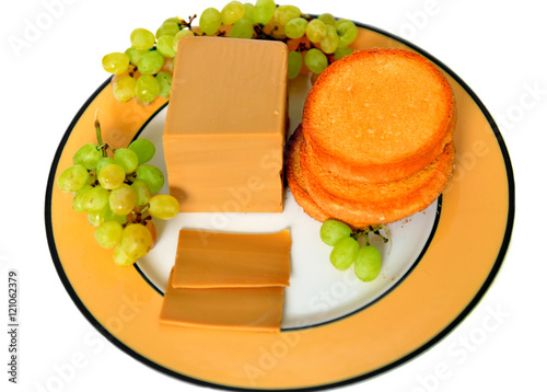 Brunost (brown cheese) is common, Norwegian name for mysost, family of cheese-related foods made with whey, milk and/or cream. Brunost is primarily produced and consumed in Norway photo