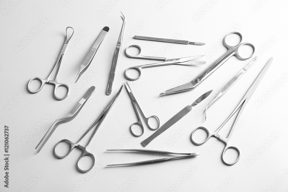 Flat lay of medical instruments on white background Flat lay of medical instruments on white background