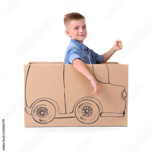 Creative boy playing with c...