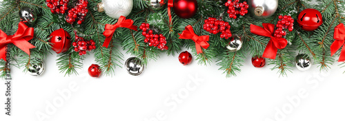 Christmas composition with fir tree branches and festive decoration on white background
