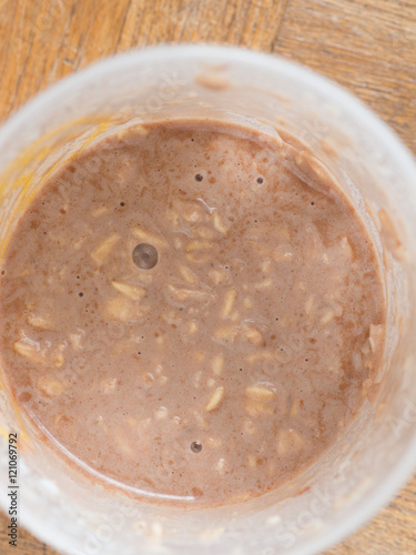 Top view of protain oatmeal shake in the protein shaker bottle photo