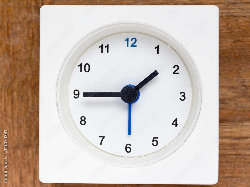 Series of the sequence of time on the simple white analog clock Series of the sequence of time on the simple white analog clock