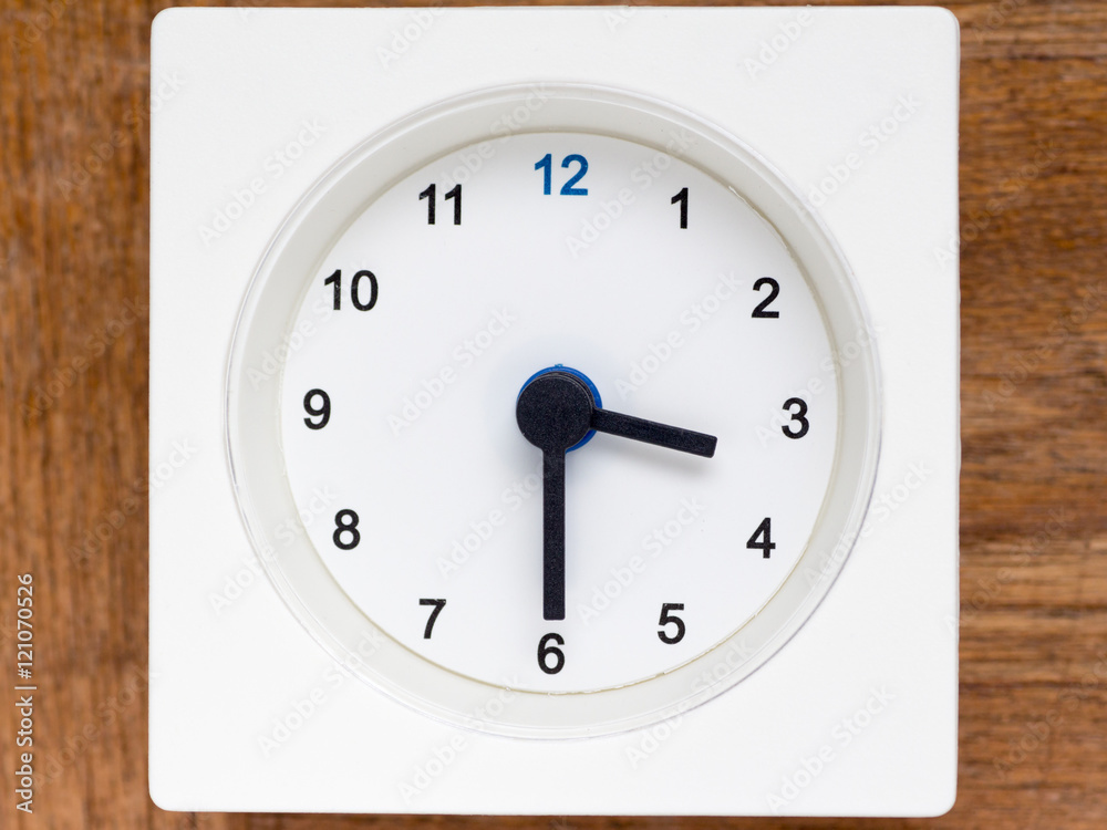 Series of the sequence of time on the simple white analog clock Series of the sequence of time on the simple white analog clock