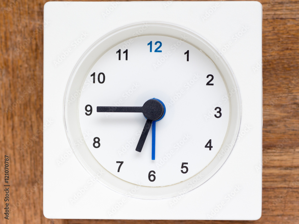 Series of the sequence of time on the simple white analog clock Series of the sequence of time on the simple white analog clock