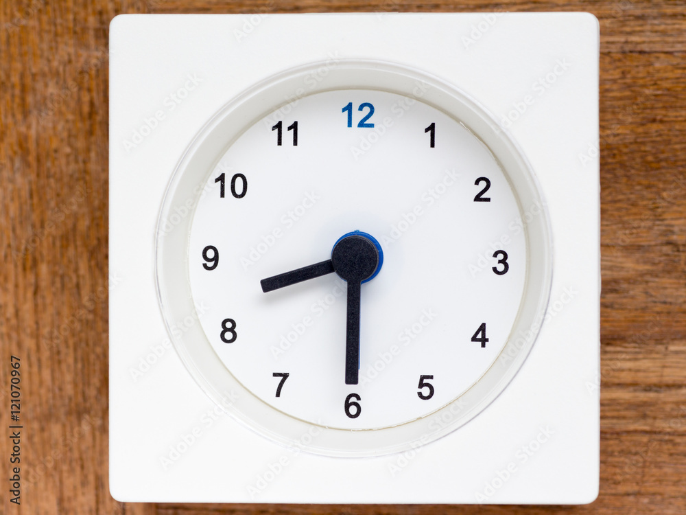 Series of the sequence of time on the simple white analog clock Series of the sequence of time on the simple white analog clock