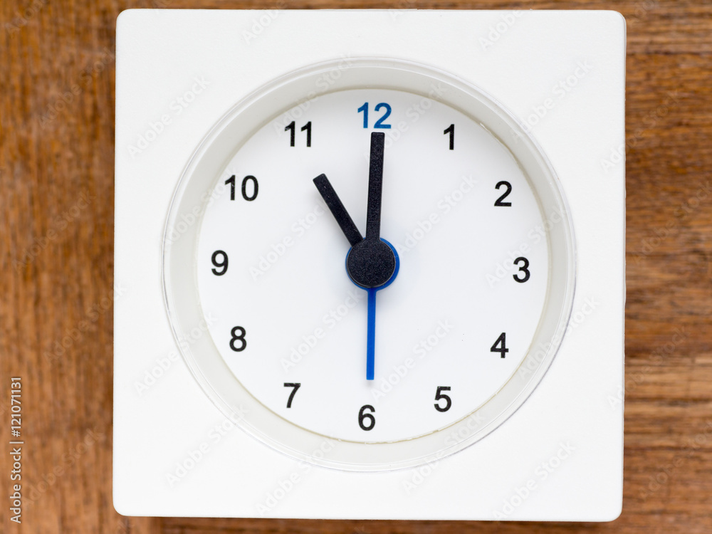 Series of the sequence of time on the simple white analog clock Series of the sequence of time on the simple white analog clock