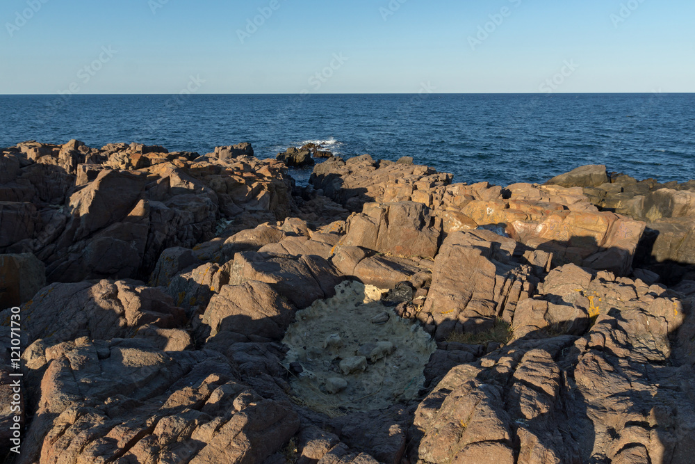 Panoramic sunset view of rocks at coastline of Sozopol town and black sea, Burgas Region, Bulgaria