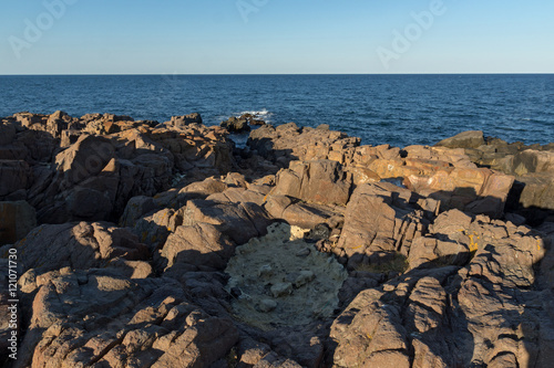 Panoramic sunset view of rocks at coastline of Sozopol town and black sea  Burgas Region  Bulgaria
